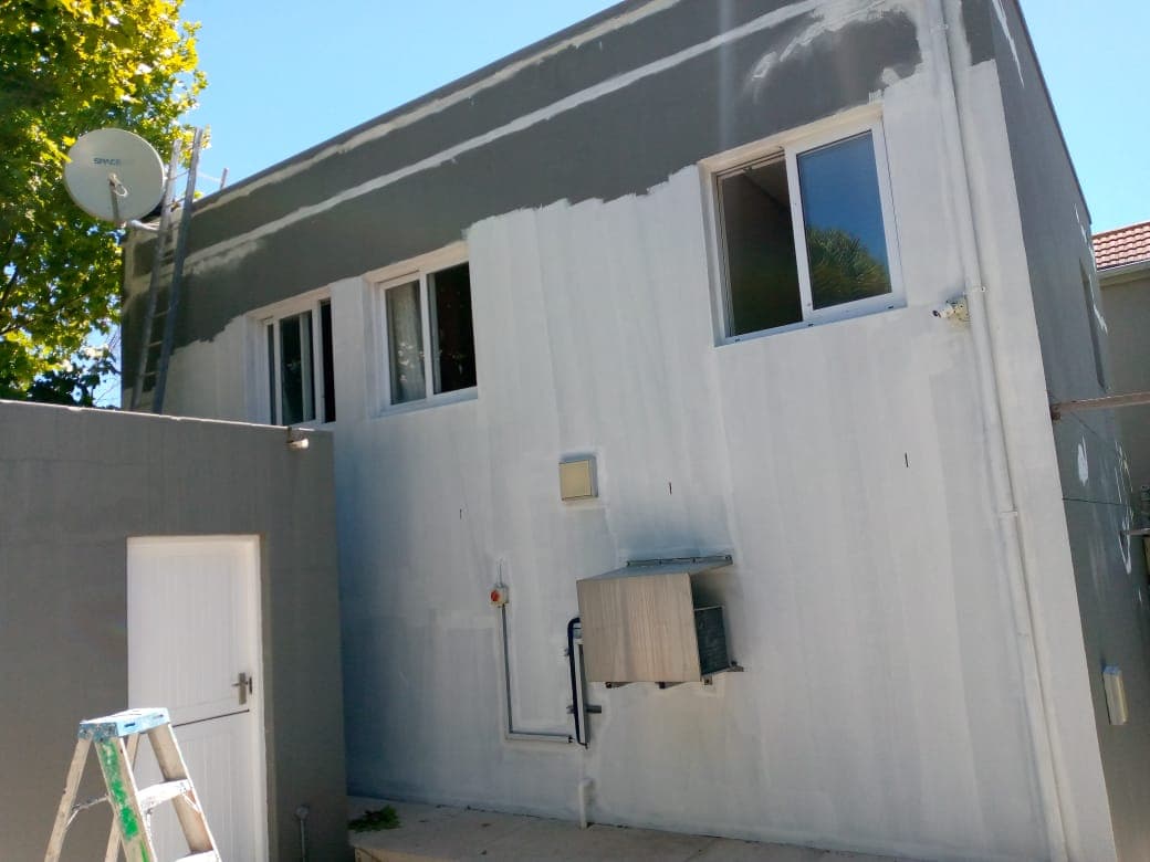 Exterior Repaint — Before